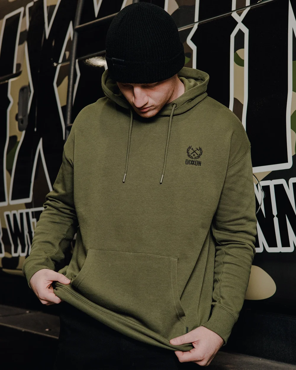 Black Crest Lightweight Pullover Hoodie in OD Green.